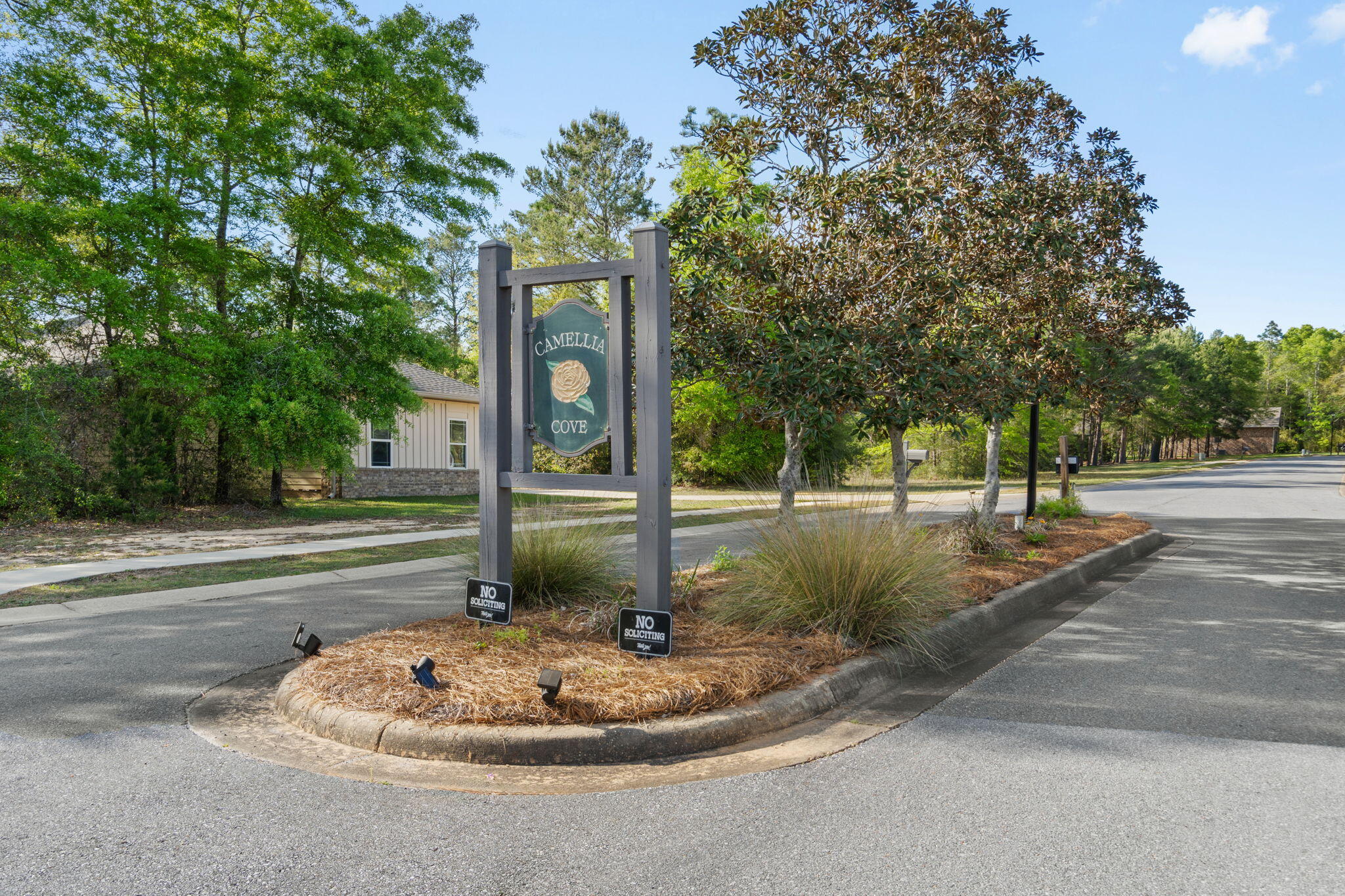 6000 Fiori Drive Crestview, FL 32539 - Photo 35 of 44 a table and chairs with fire pit in the back yard