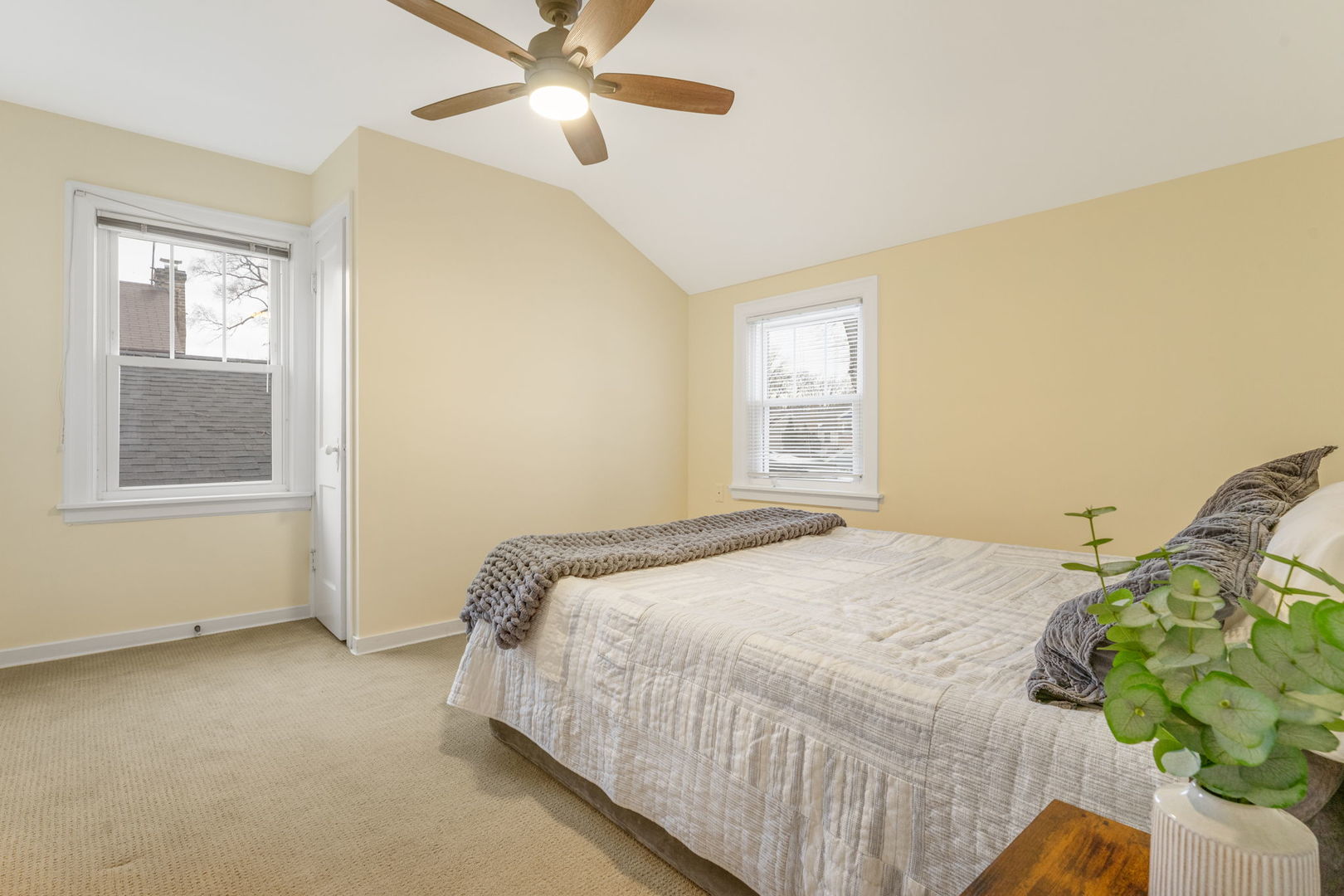 1927 Warren Street Evanston, IL 60202 - Photo 14 of 25 a bedroom with a bed and window