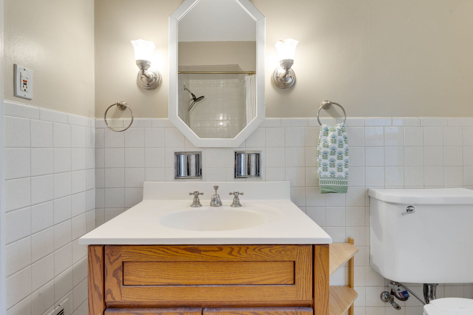 1927 Warren Street Evanston, IL 60202 - Photo 16 of 25 a bathroom with a sink a toilet and a mirror