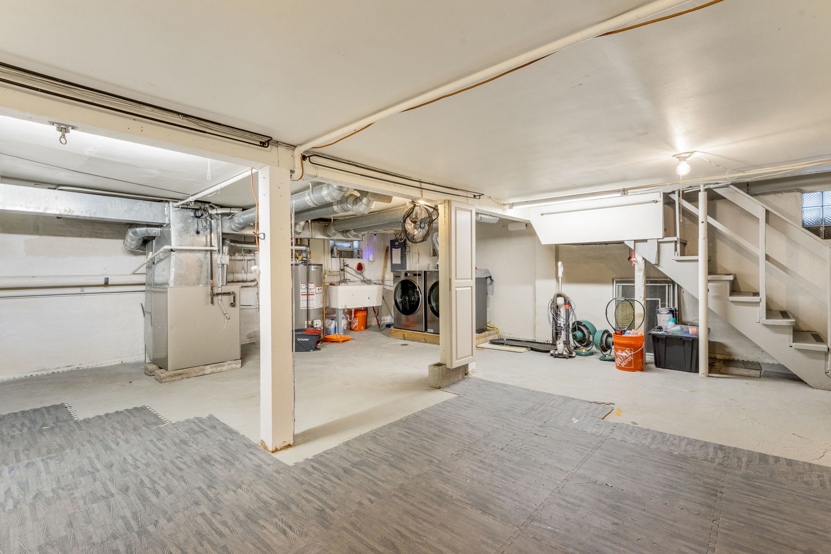 1927 Warren Street Evanston, IL 60202 - Photo 21 of 25 a view of a garage with furniture