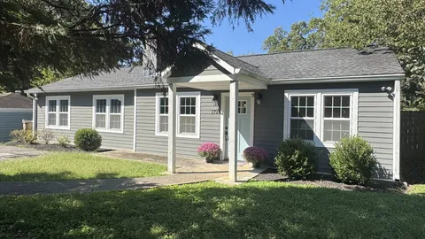 a house view with a garden space
