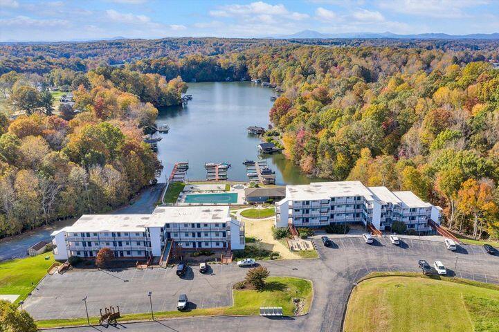 a view of swimming pool with outdoor seating and yard