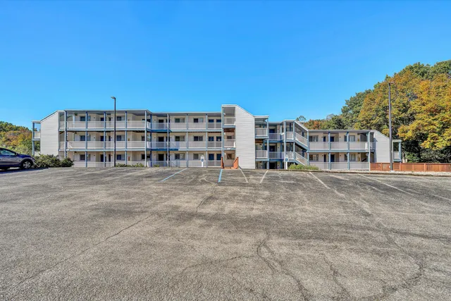 a view of a building with a street