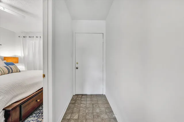 a view of a bedroom from the hallway