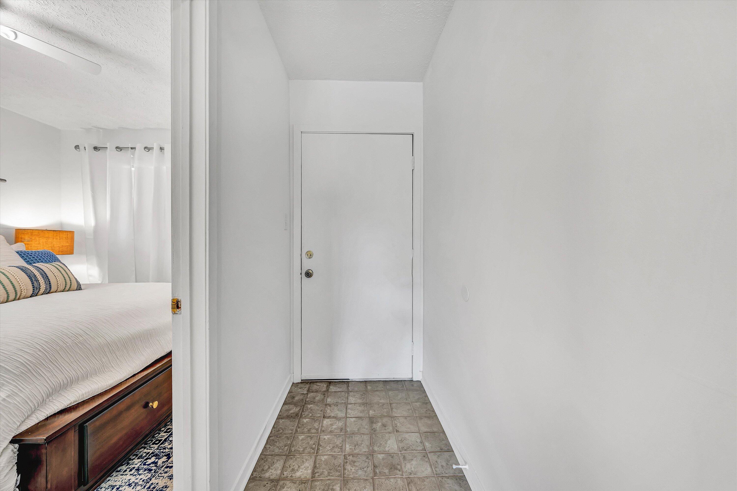 1089 Bluewater Drive, Unit 414 Moneta, VA 24121 - Photo 7 of 30 a view of a bedroom from the hallway