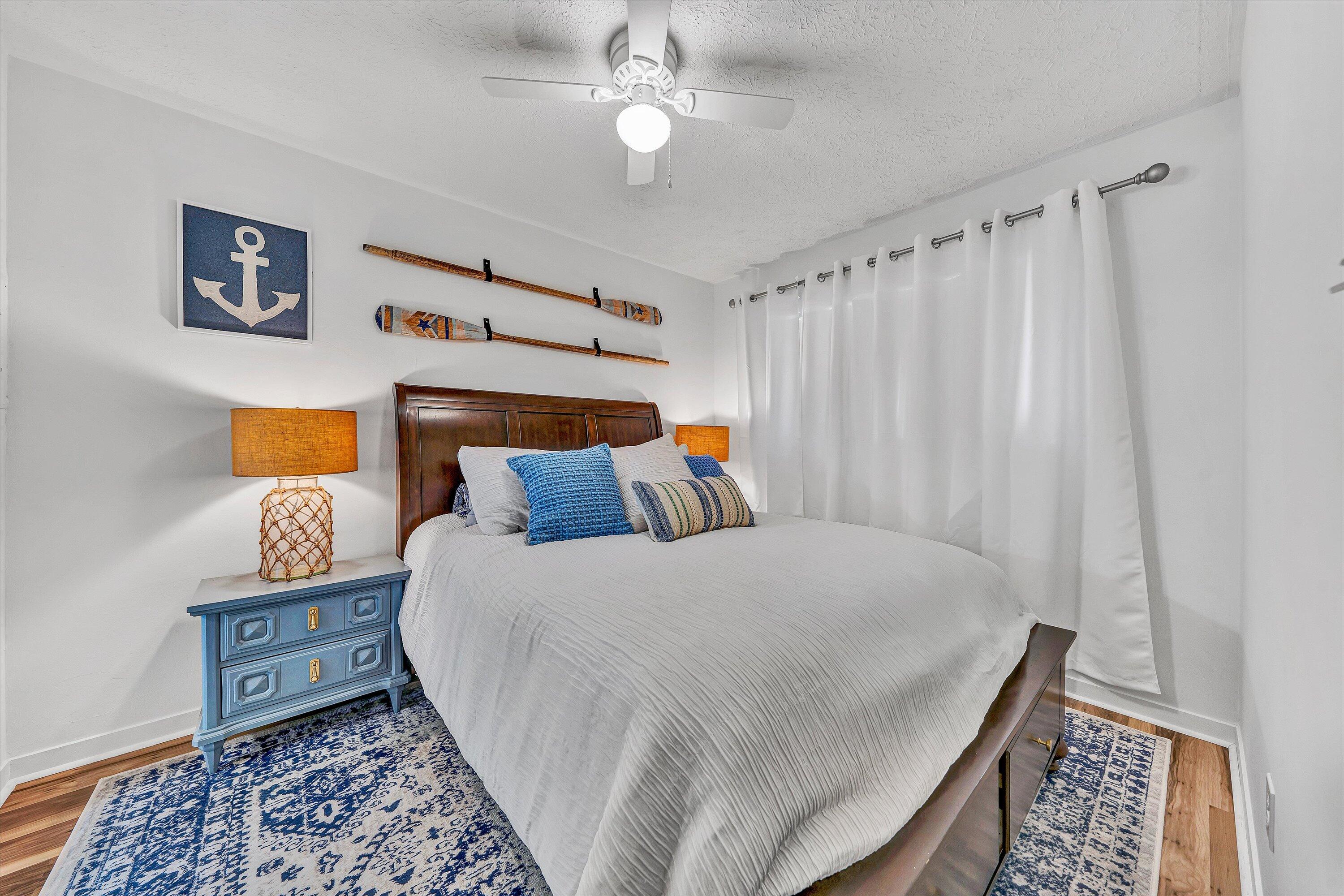 1089 Bluewater Drive, Unit 414 Moneta, VA 24121 - Photo 9 of 30 a bedroom with a bed and a window