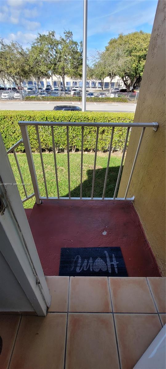 15650 Southwest 80th Street, Unit F208 Miami, FL 33193 - Photo 5 of 5 a view of an outdoor space with seating area