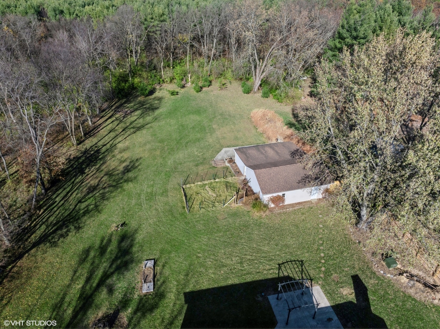 5881 Tipple Road Rockford, IL 61102 - Photo 12 of 32 an aerial view of a house with a yard