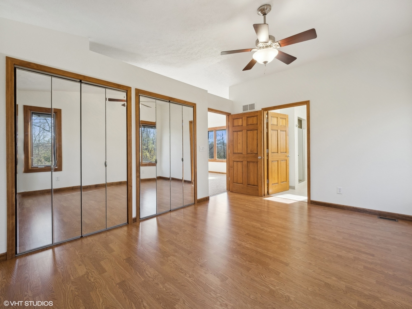 5881 Tipple Road Rockford, IL 61102 - Photo 20 of 32 a view of an empty room with wooden floor and a window