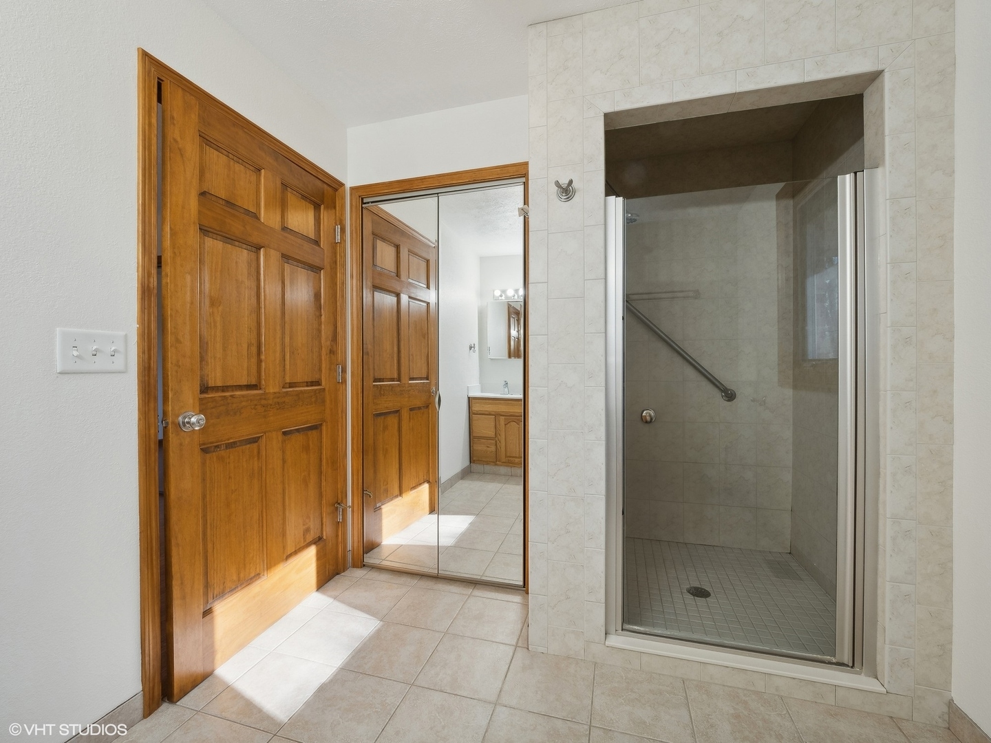 5881 Tipple Road Rockford, IL 61102 - Photo 22 of 32 a bathroom with a shower and a glass door
