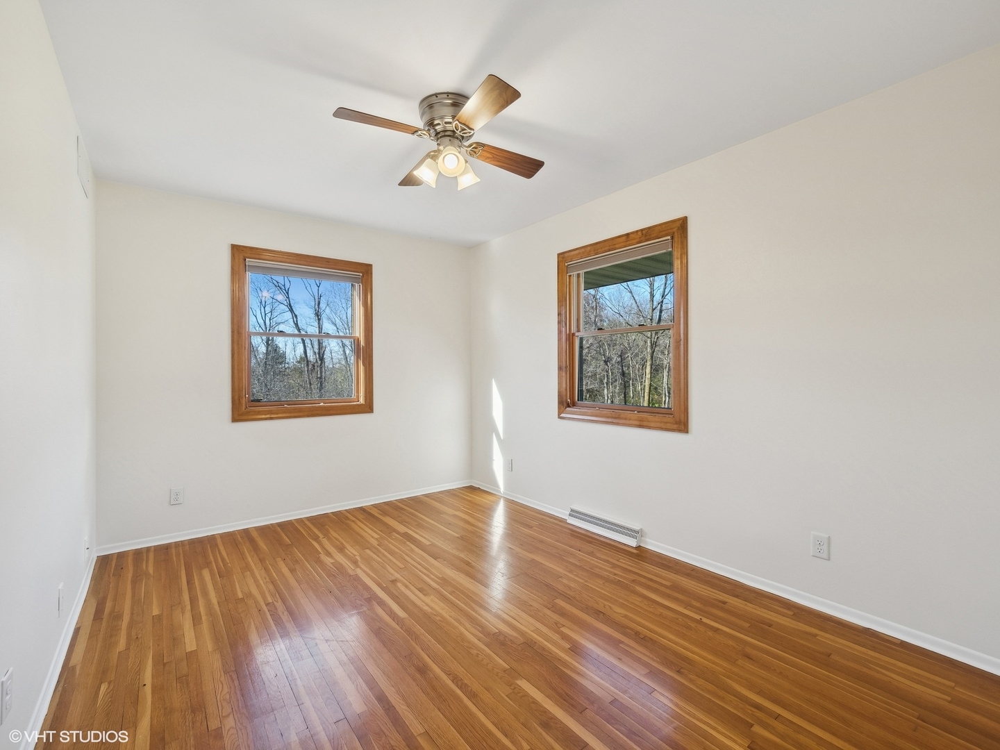 5881 Tipple Road Rockford, IL 61102 - Photo 27 of 32 a view of empty room with wooden floor