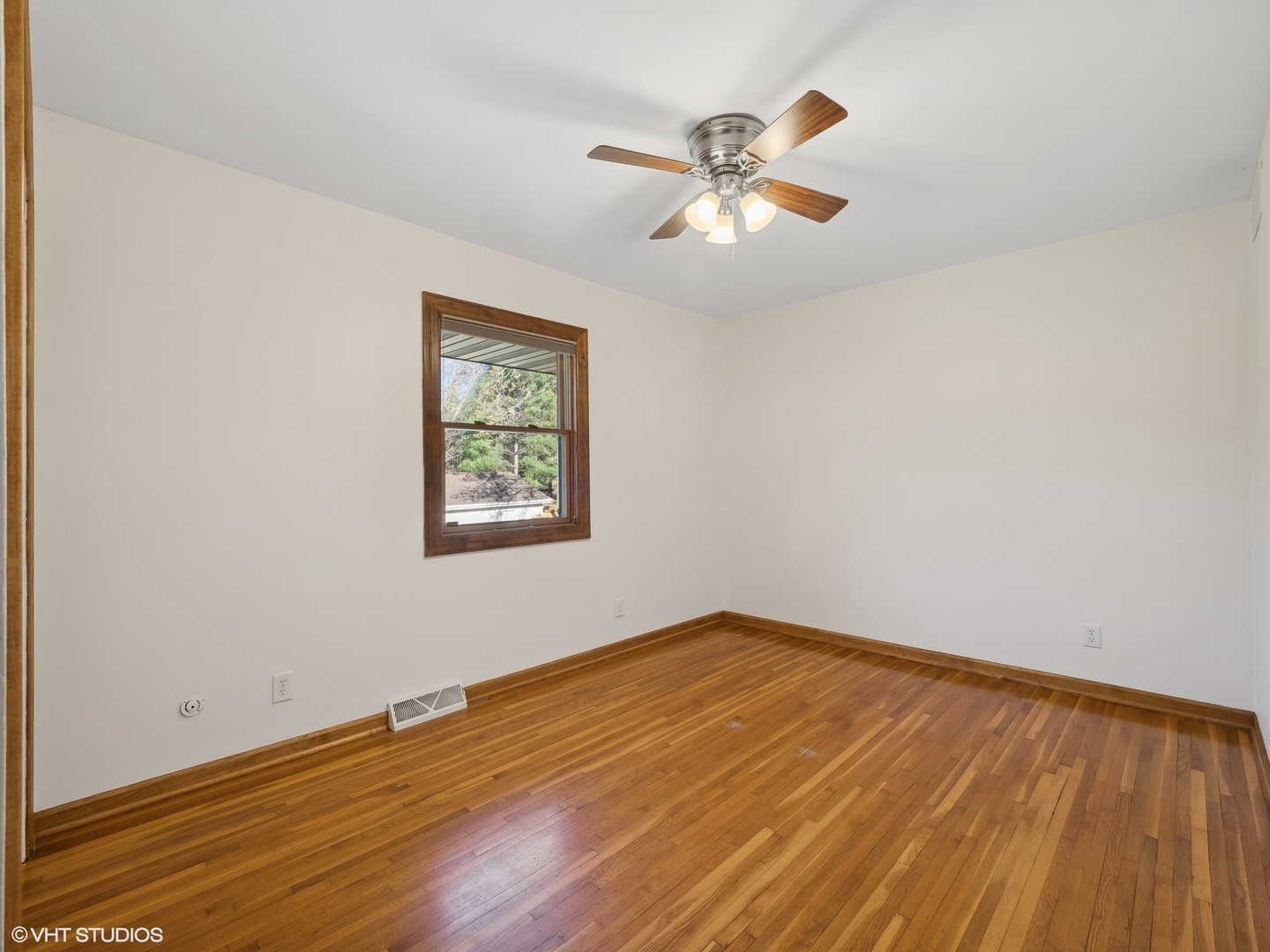 5881 Tipple Road Rockford, IL 61102 - Photo 28 of 32 a view of empty room with wooden floor