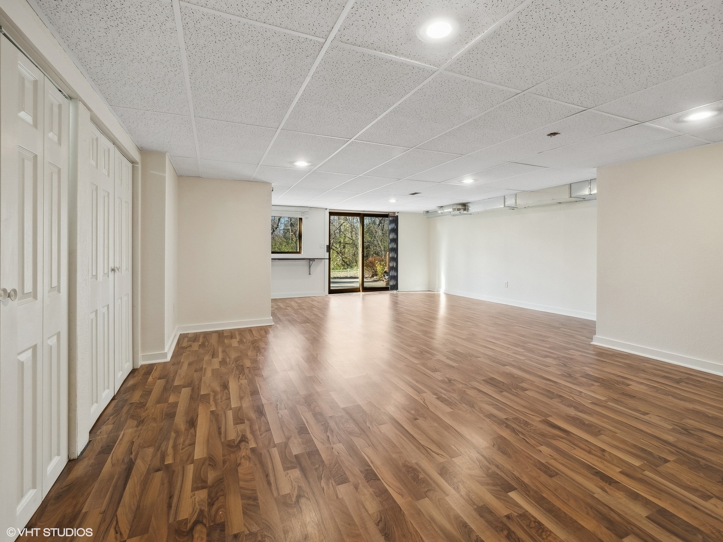 5881 Tipple Road Rockford, IL 61102 - Photo 29 of 32 a view of an empty room with wooden floor