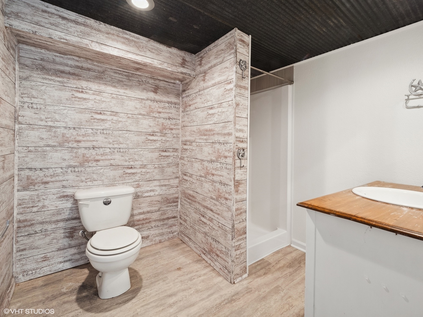 5881 Tipple Road Rockford, IL 61102 - Photo 31 of 32 a bathroom with a toilet and a shower