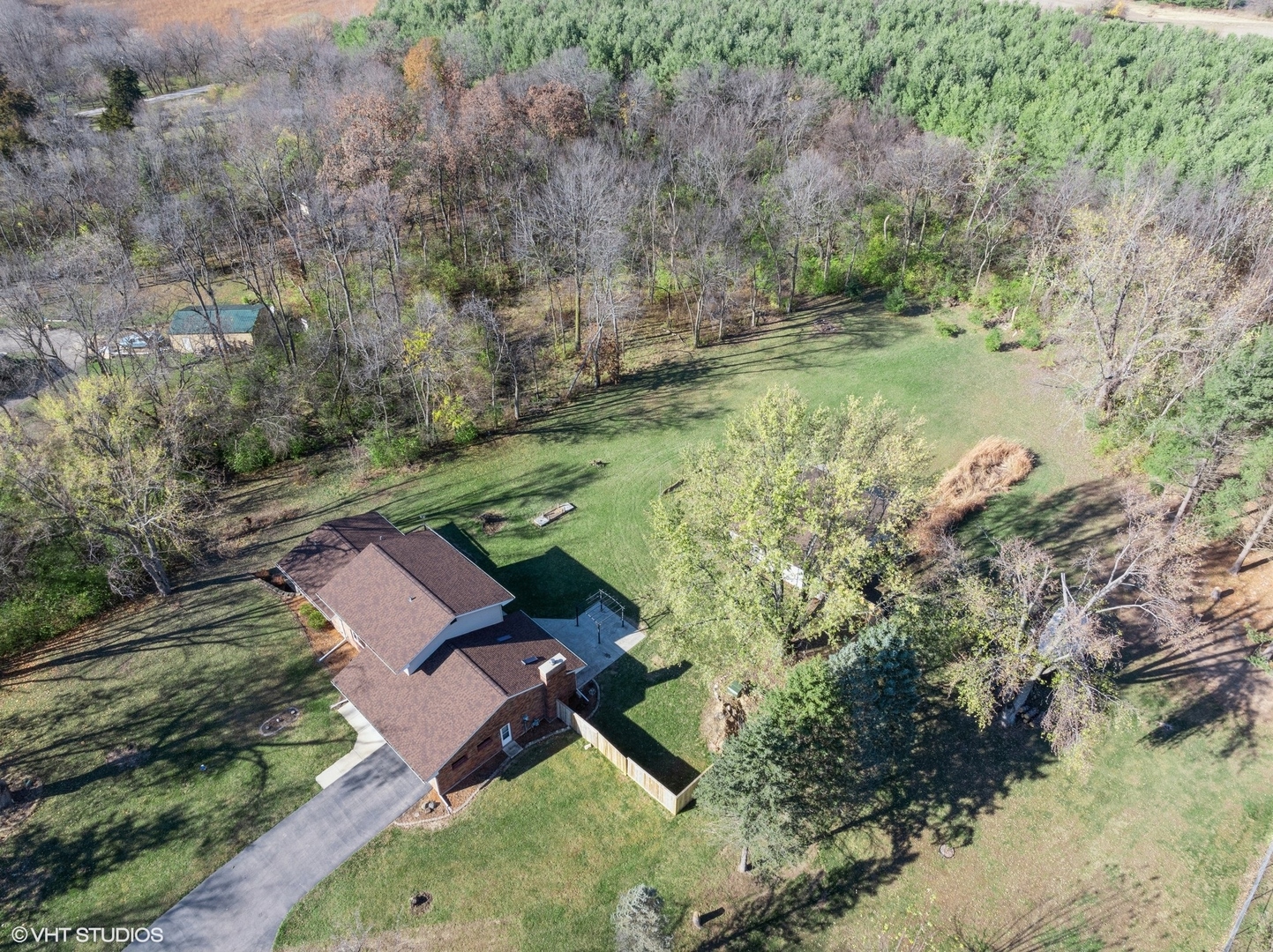 5881 Tipple Road Rockford, IL 61102 - Photo 8 of 32 an aerial view of a house with a yard