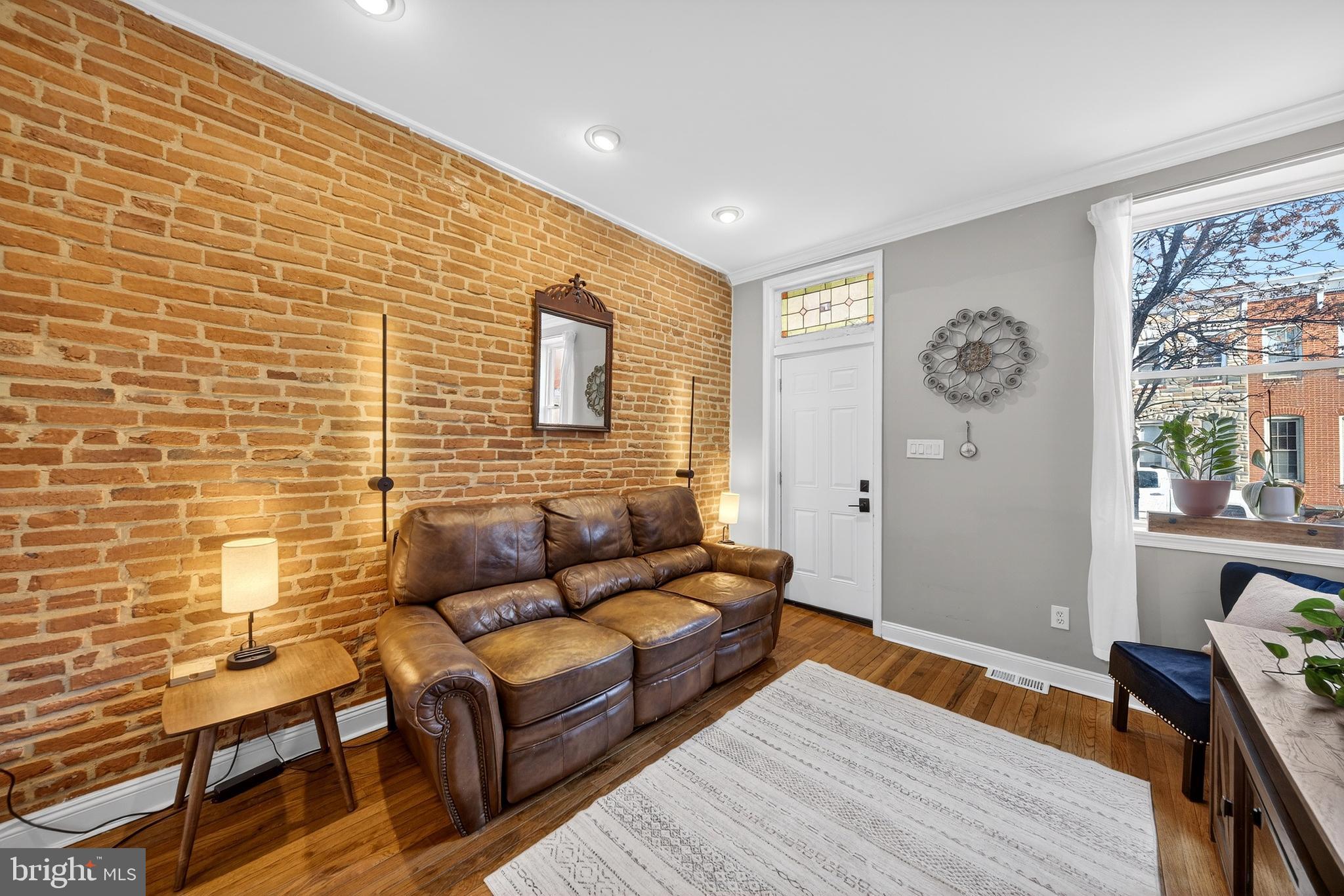 7 East Fort Avenue Baltimore, MD 21230 - Photo 13 of 73 a living room with furniture and a wooden floor