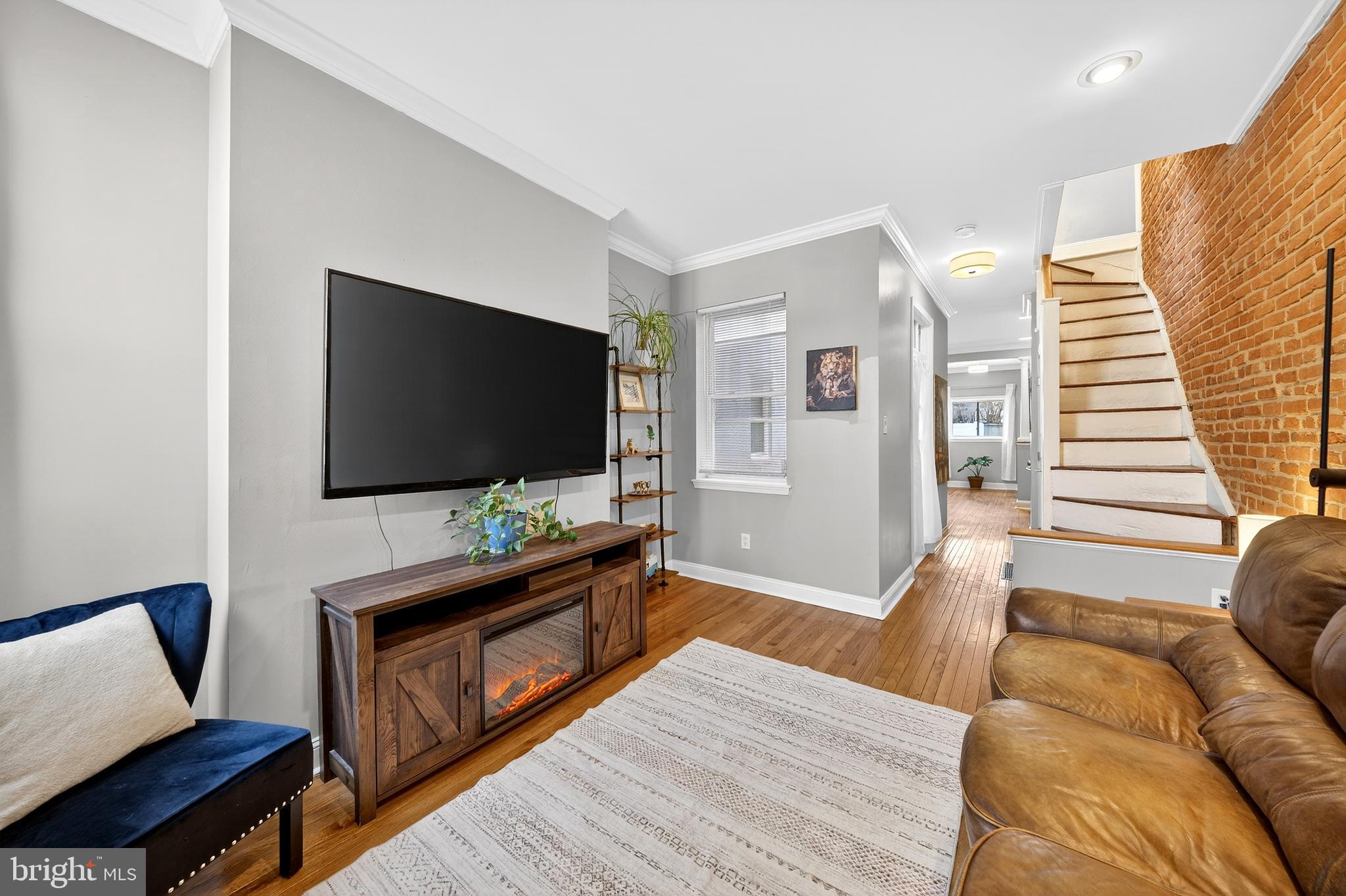 7 East Fort Avenue Baltimore, MD 21230 - Photo 17 of 73 a living room with furniture and a flat screen tv