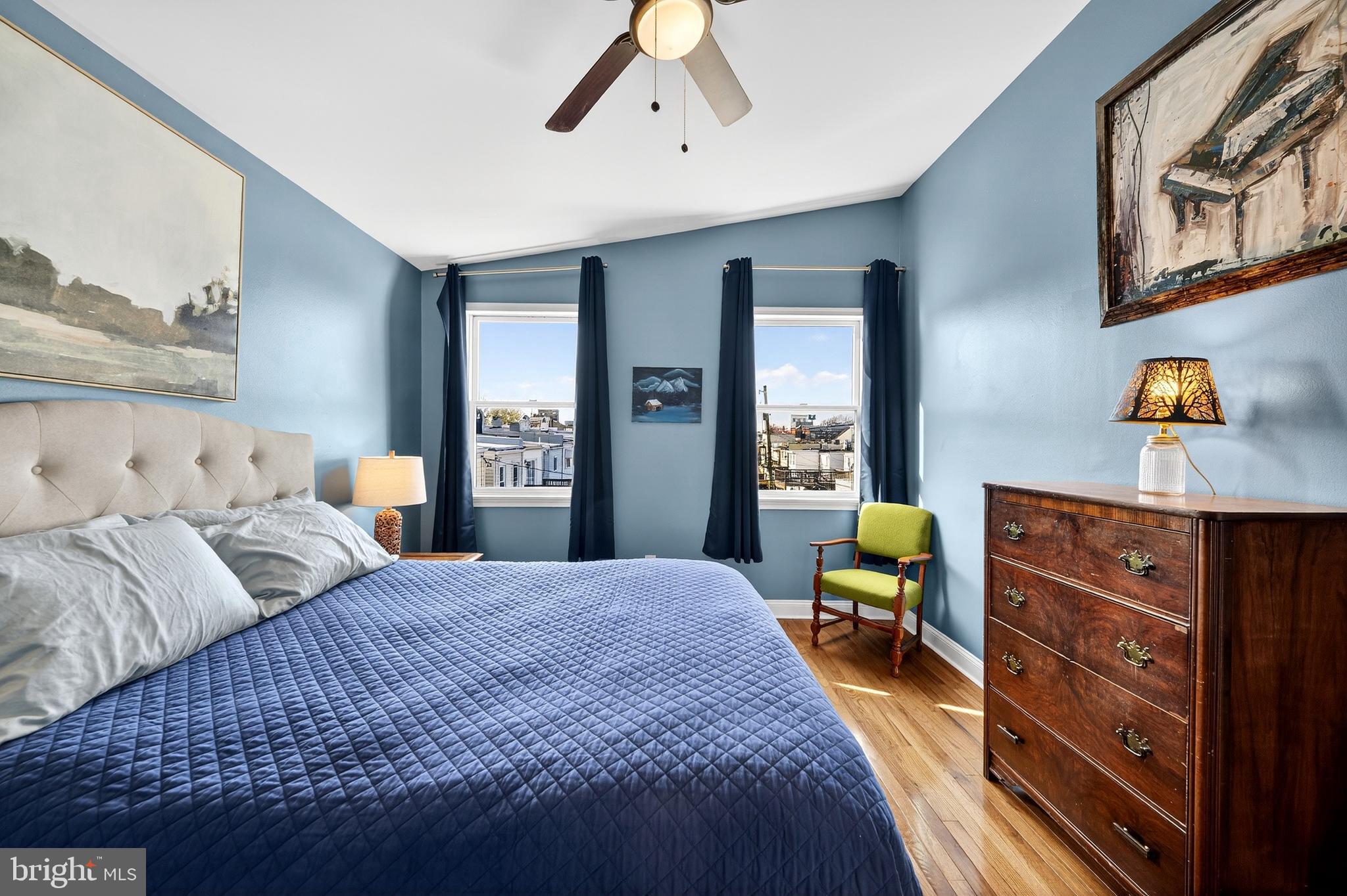 7 East Fort Avenue Baltimore, MD 21230 - Photo 30 of 73 a bedroom with a bed and wooden floor