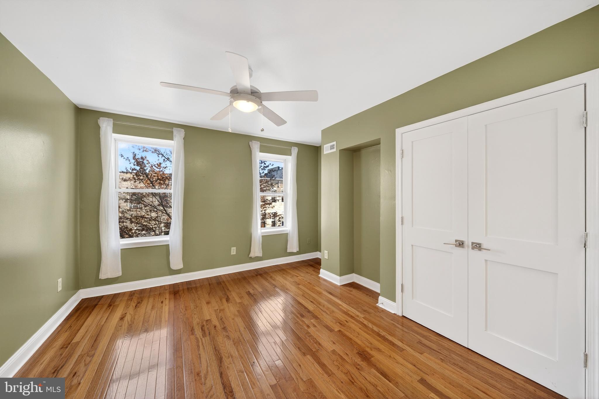 7 East Fort Avenue Baltimore, MD 21230 - Photo 32 of 73 a view of livingroom with hardwood floor and window