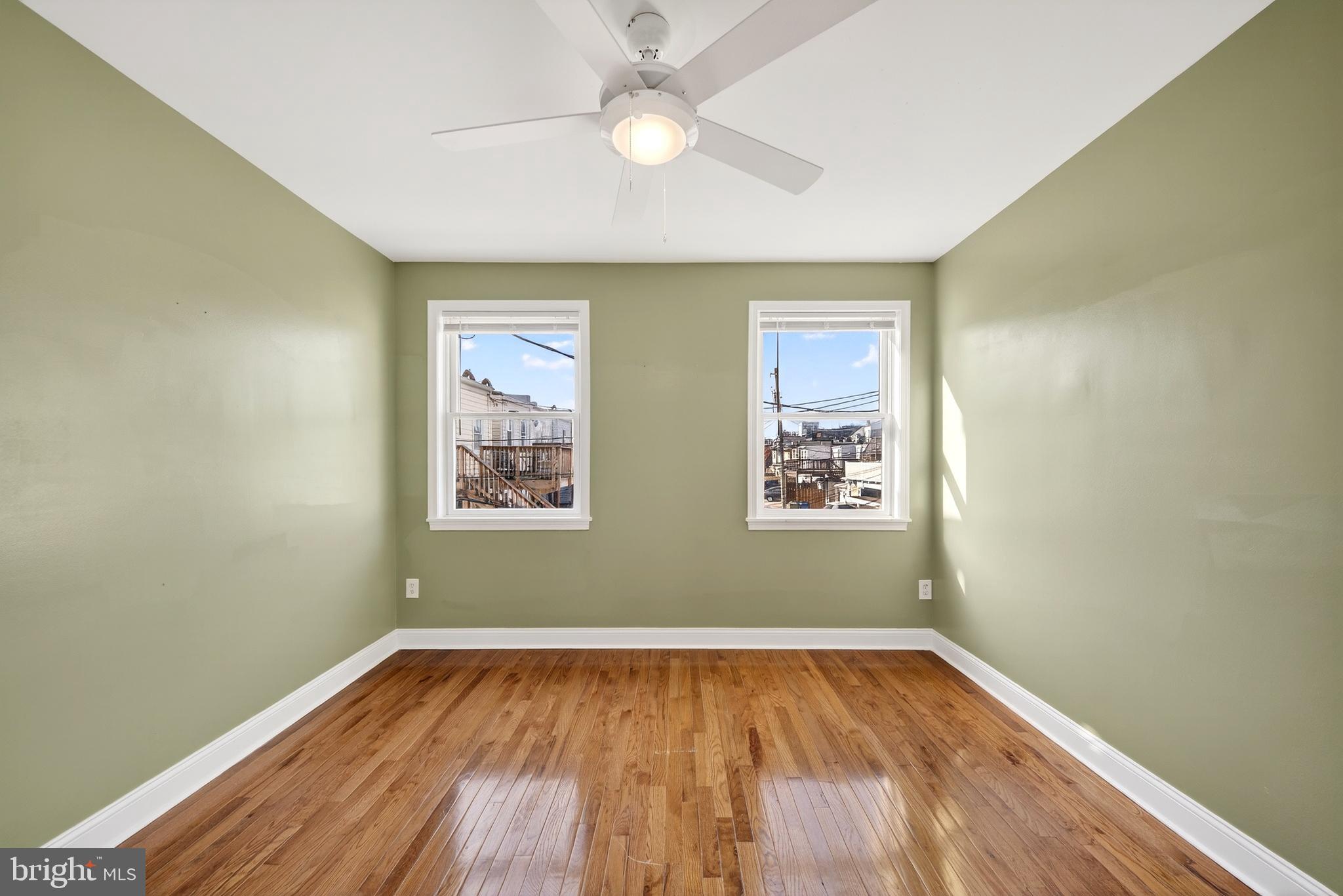 7 East Fort Avenue Baltimore, MD 21230 - Photo 37 of 73 a view of room with window and wooden floor