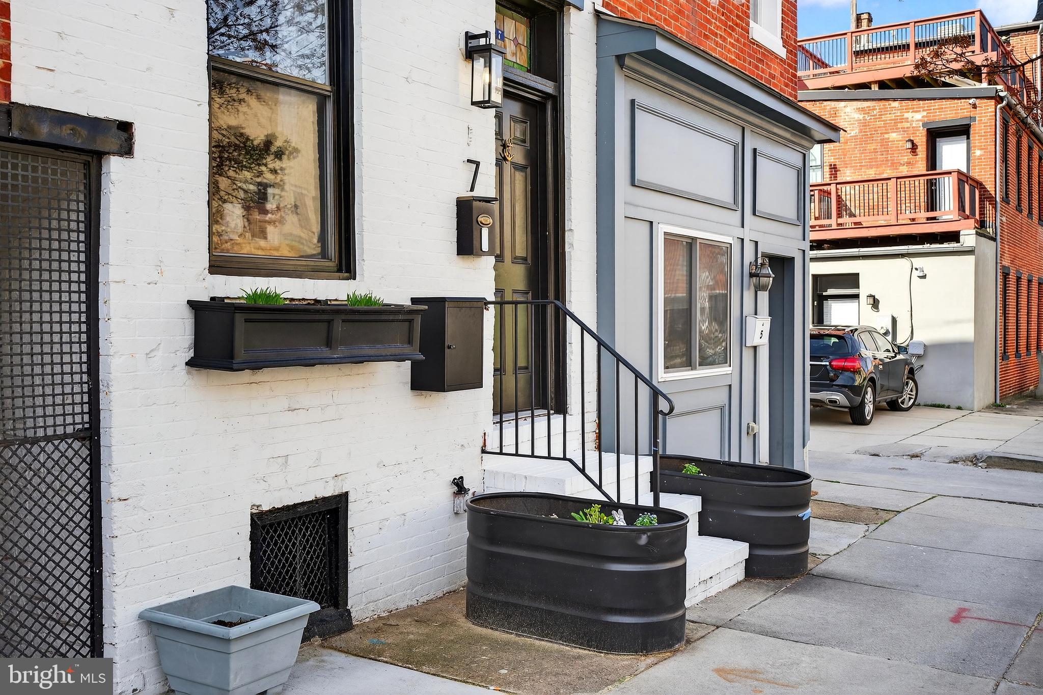 7 East Fort Avenue Baltimore, MD 21230 - Photo 46 of 73 a front view of a house with outdoor seating