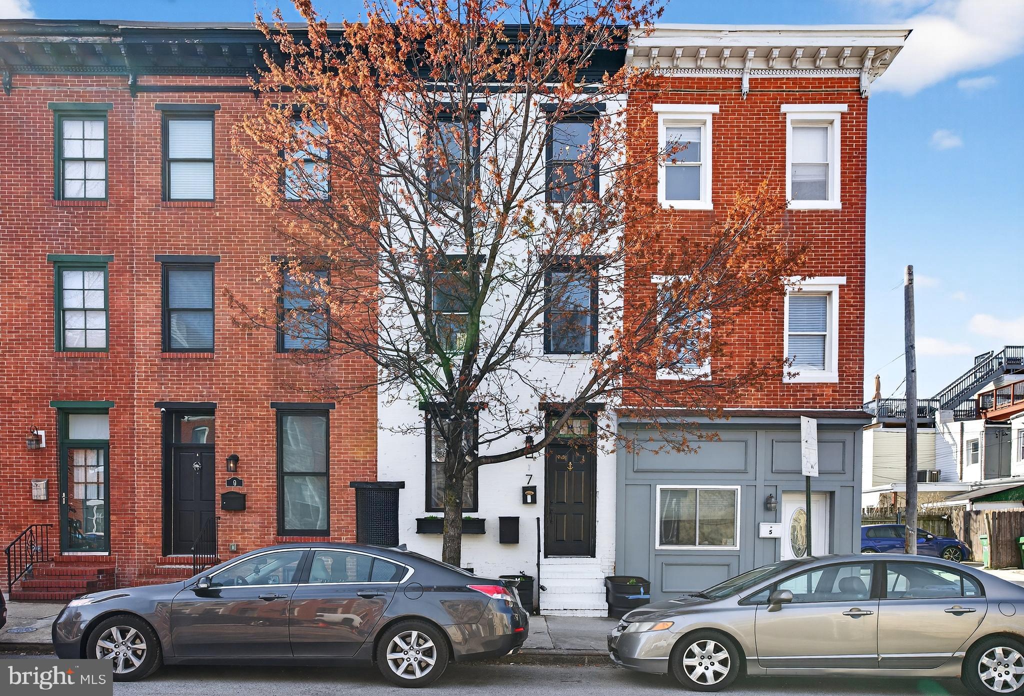 7 East Fort Avenue Baltimore, MD 21230 - Photo 61 of 73 a front view of a building with parking space