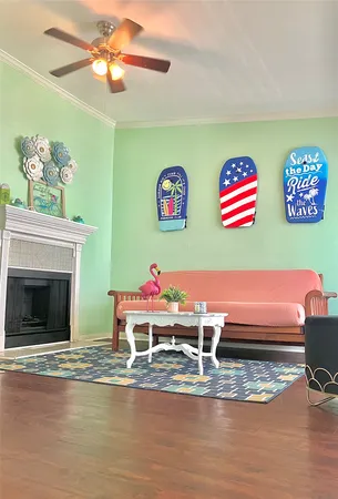 a view of dining room with furniture and a fireplace