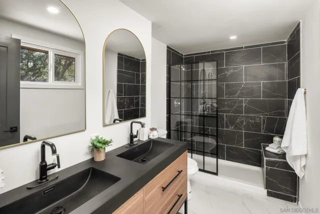 a view of bathroom with a tub and sink