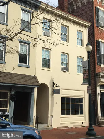 a view of a building with a street