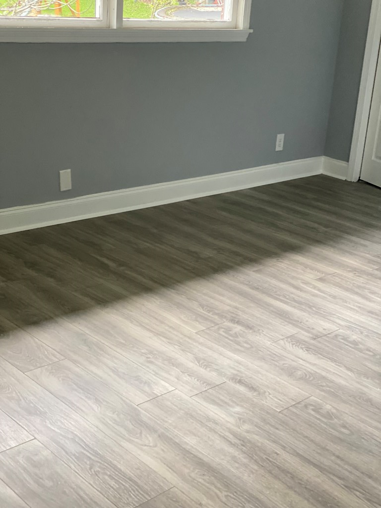 1061 Dunbar Avenue Columbus, GA 31906 - Photo 5 of 23 a view of wooden floor and windows in a room