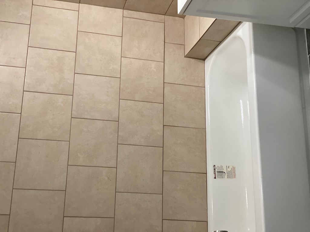 1061 Dunbar Avenue Columbus, GA 31906 - Photo 7 of 23 a bathroom with a shower