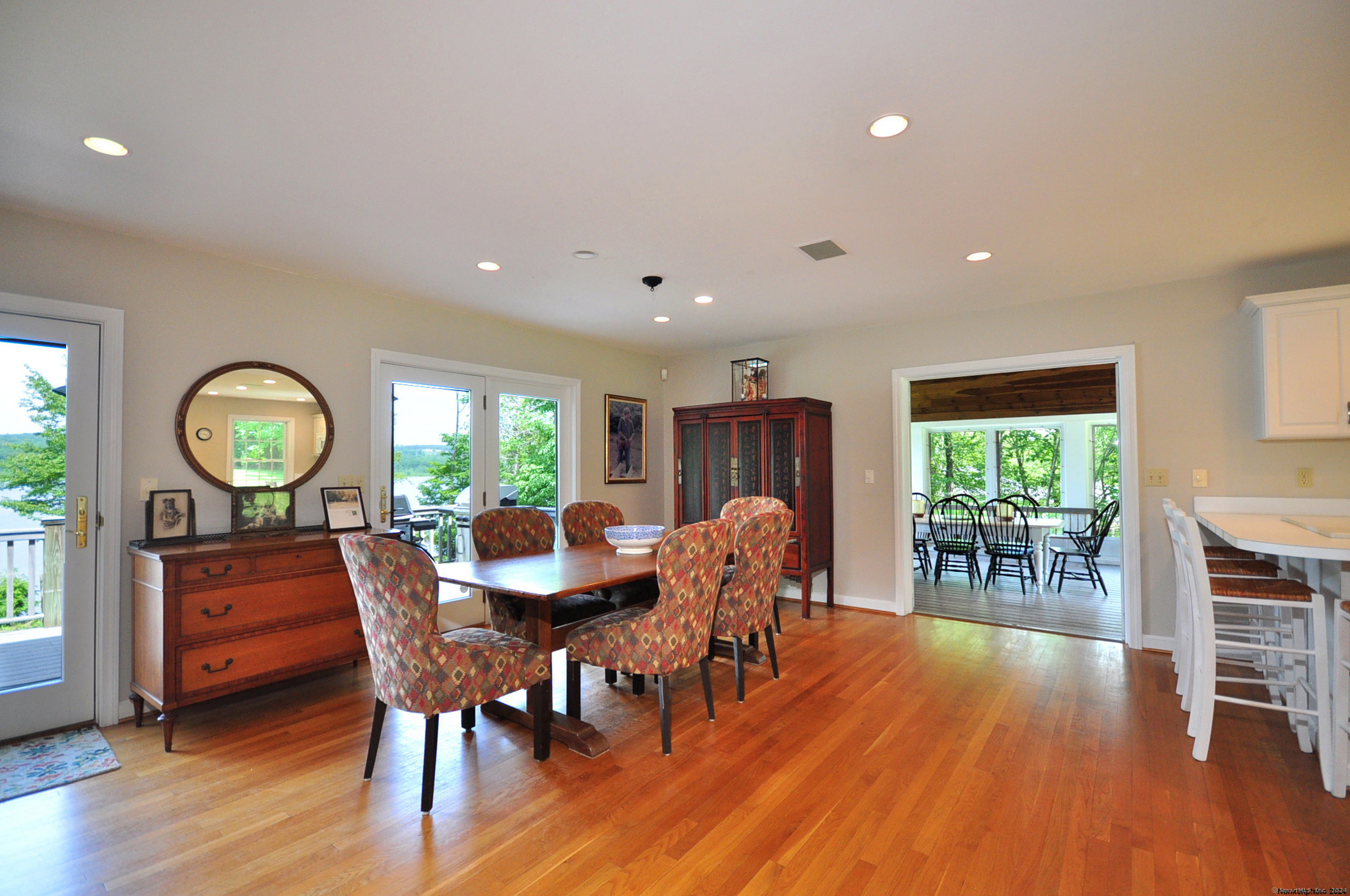 72 Sandy Beach Road Goshen, CT 06756 - Photo 11 of 33 a view of a dining room with furniture window and wooden floor