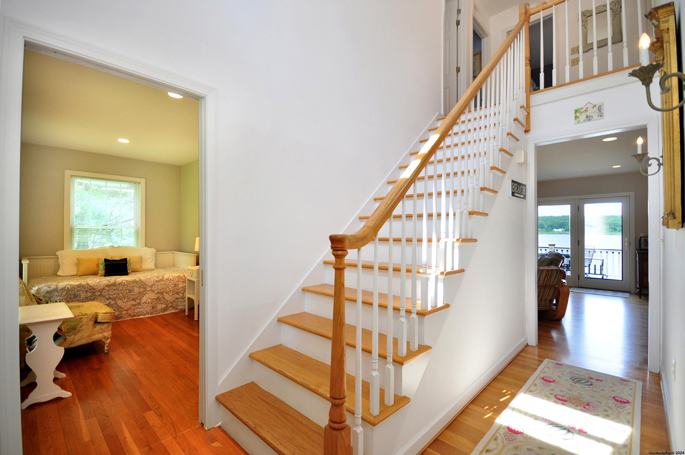 72 Sandy Beach Road Goshen, CT 06756 - Photo 16 of 33 a view of entryway bedroom and hall with wooden floor