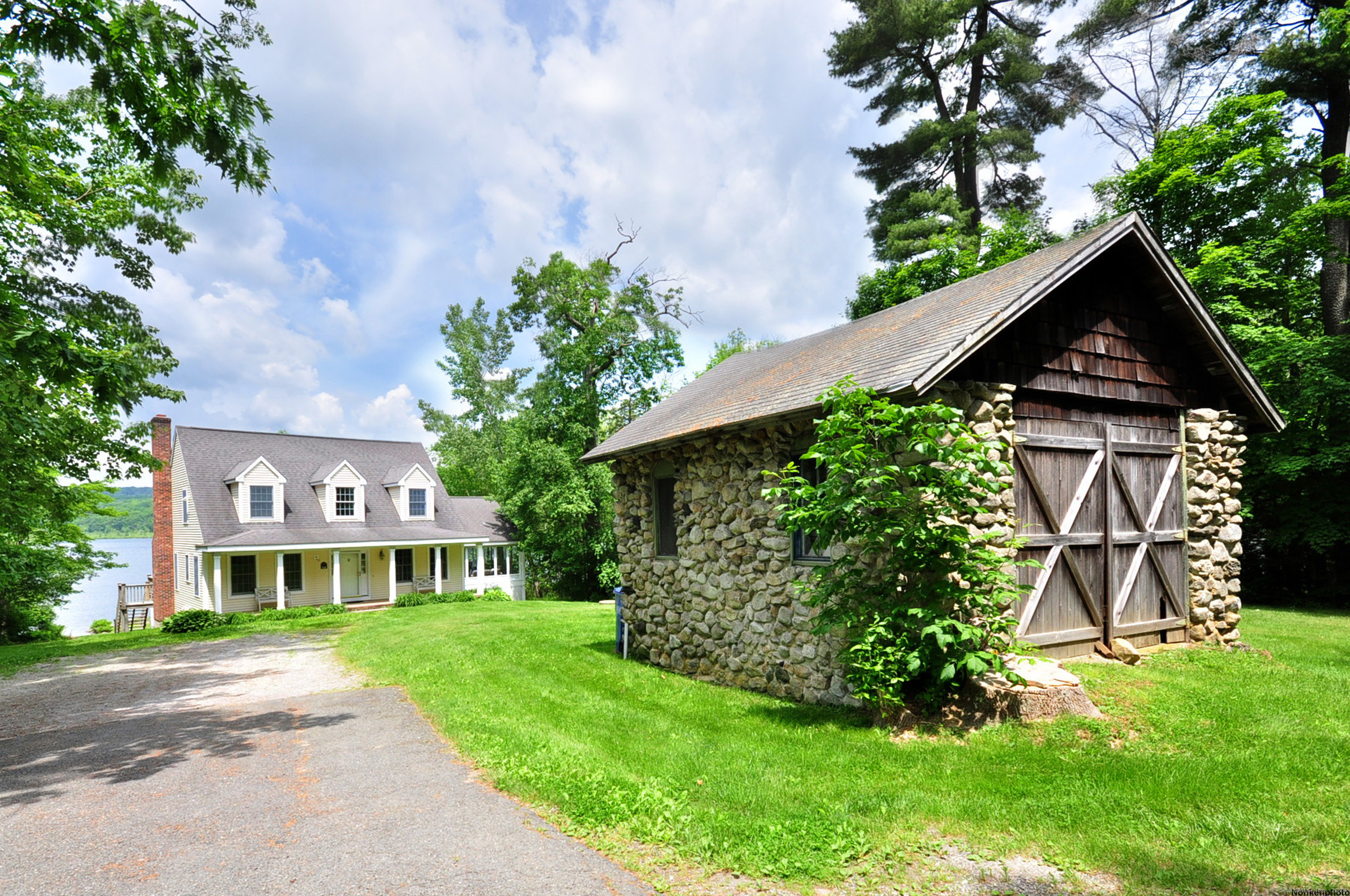 72 Sandy Beach Road Goshen, CT 06756 - Photo 30 of 33 a front view of a house with a yard