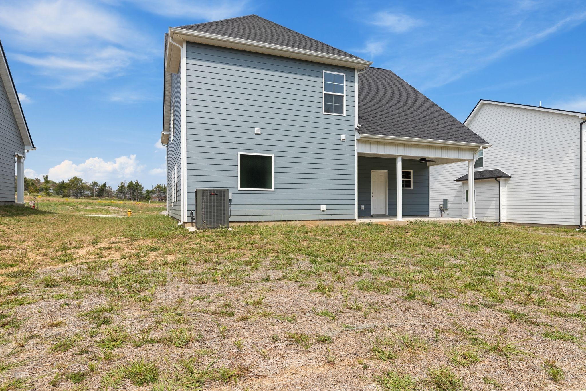 443 Generosity Way Smyrna, TN 37167 - Photo 33 of 37 a house that has a large window in front of it
