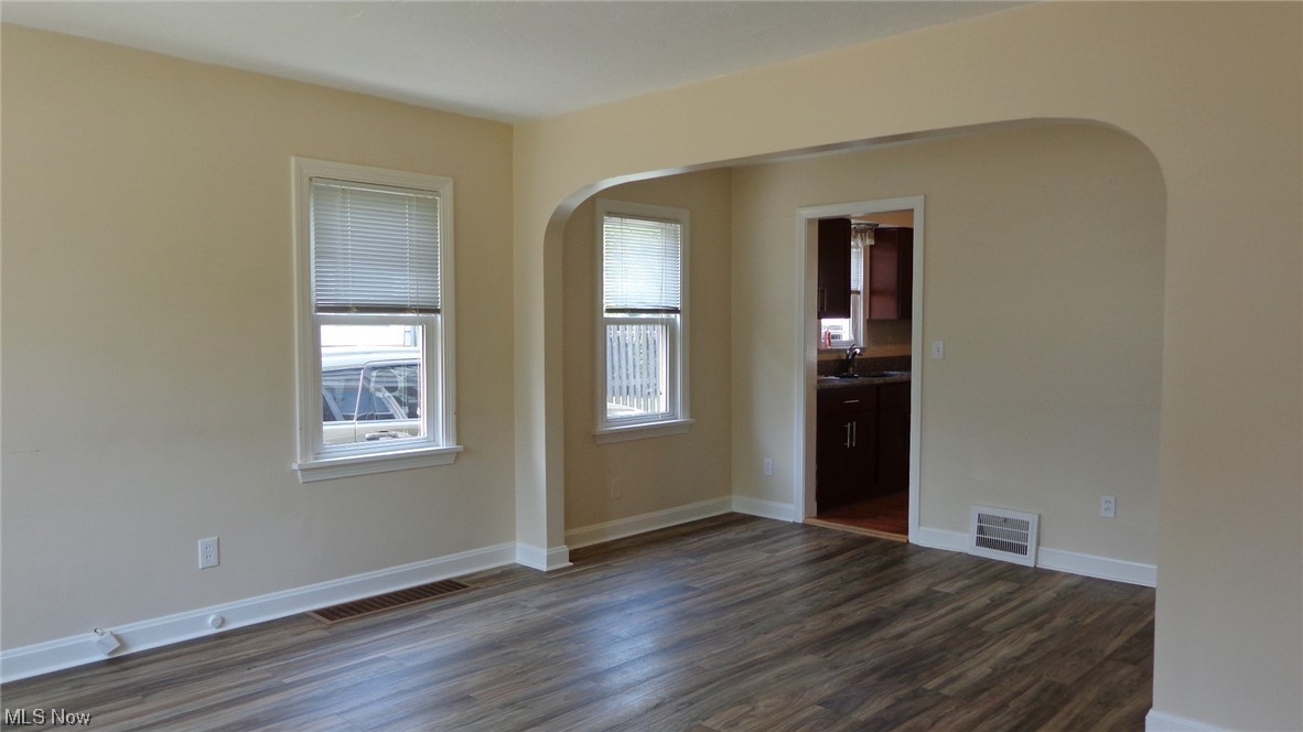 4517 Telhurst Road Cleveland, OH 44121 - Photo 5 of 23 living room to dining rea