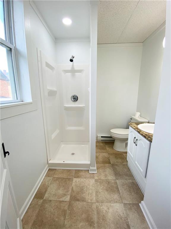 7 Main Street Lyndora, PA 16045 - Photo 17 of 25 a bathroom with a sink a toilet and shower