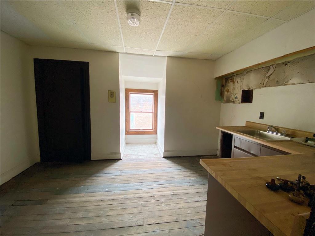 7 Main Street Lyndora, PA 16045 - Photo 19 of 25 a kitchen with stainless steel appliances granite countertop a refrigerator and a stove