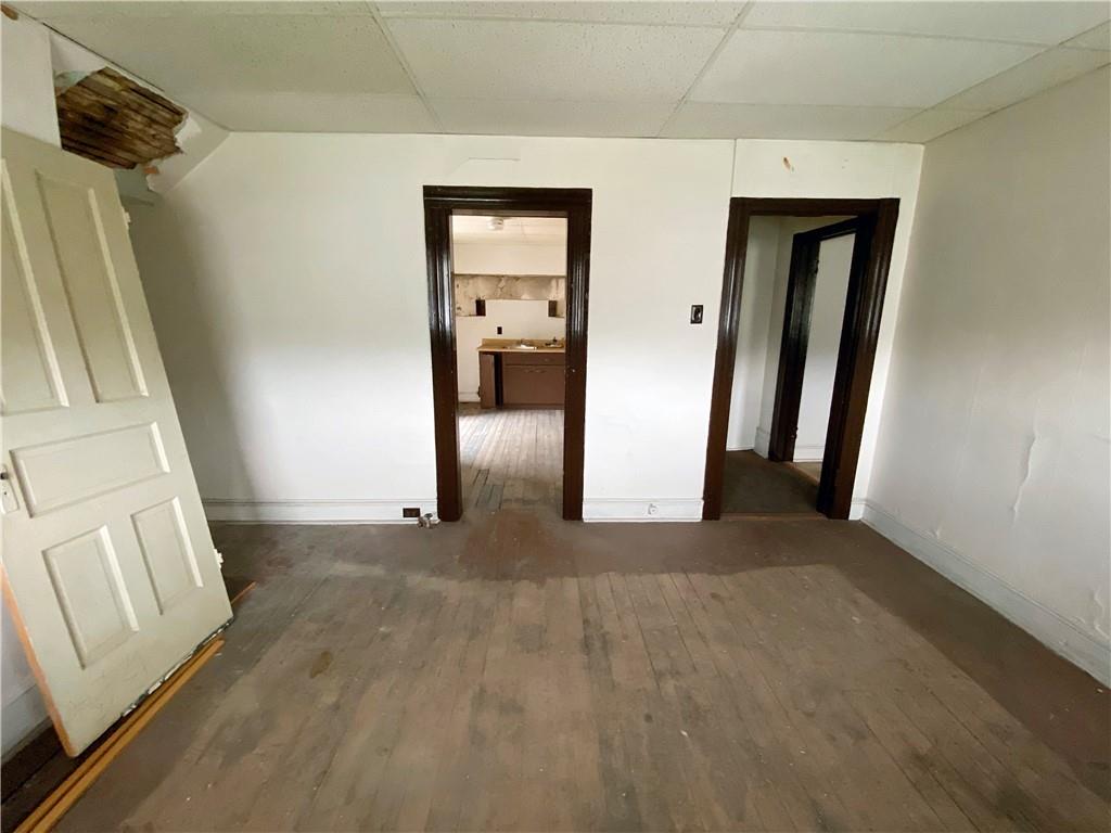 7 Main Street Lyndora, PA 16045 - Photo 22 of 25 a view of a hallway with wooden floor and staircase