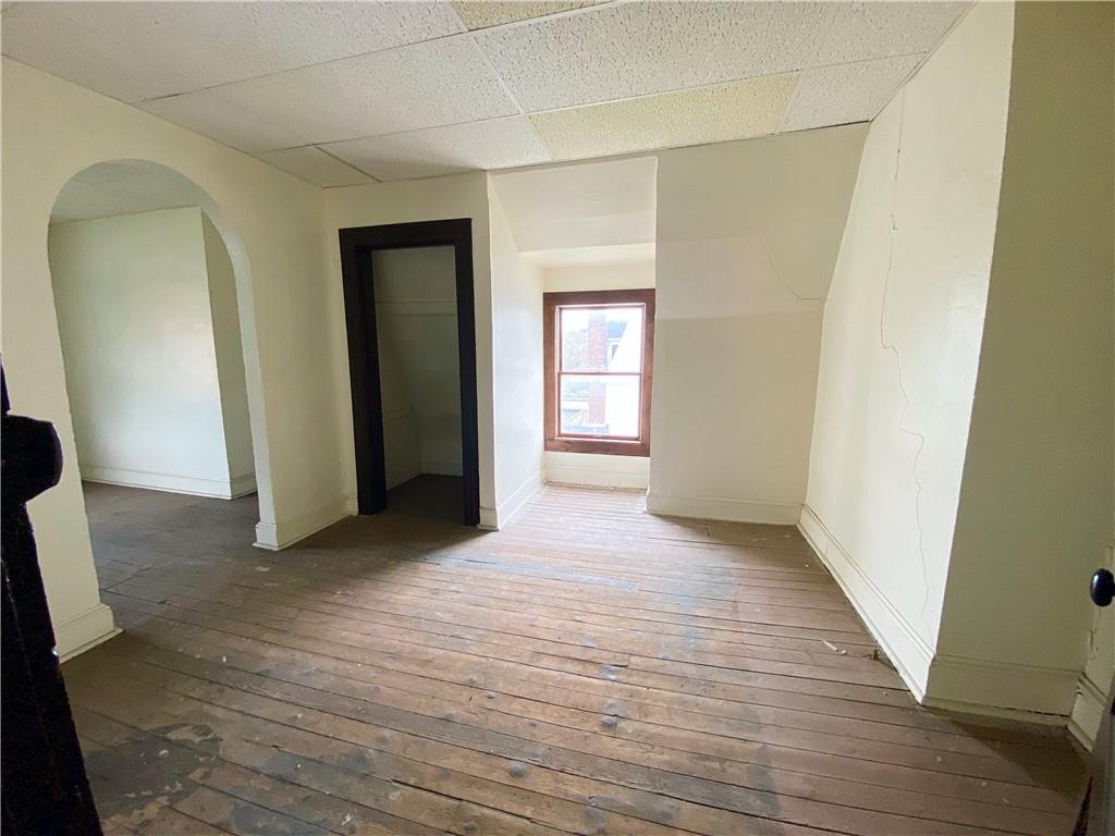 7 Main Street Lyndora, PA 16045 - Photo 24 of 25 a view of a hallway with wooden floor and closet
