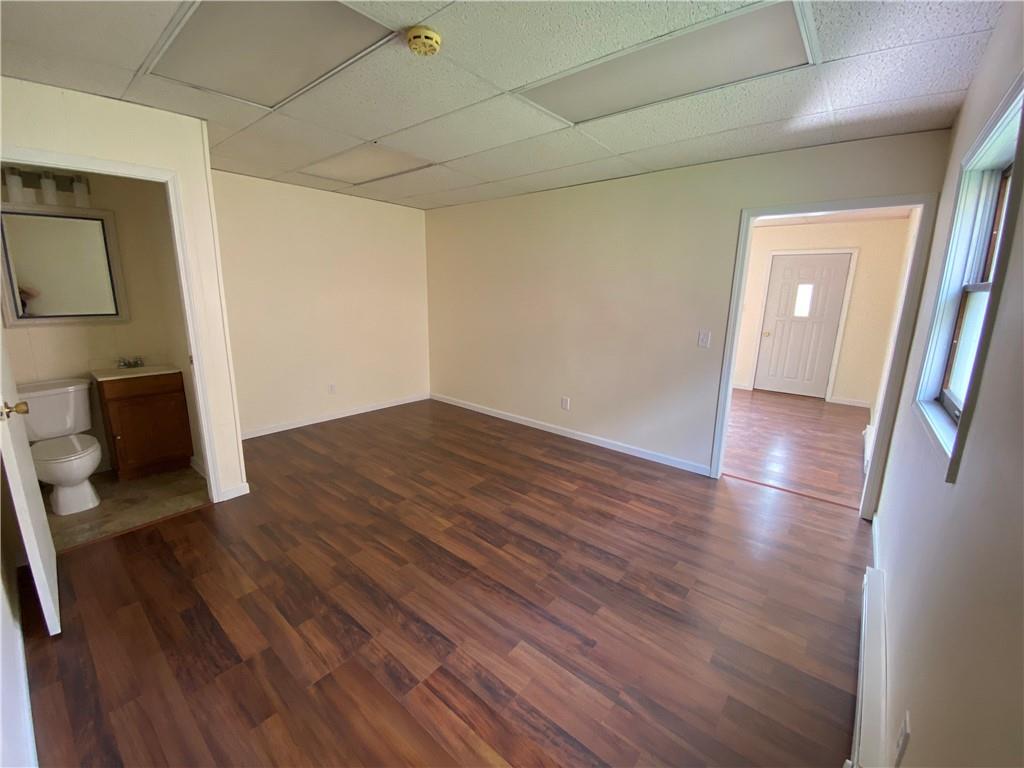7 Main Street Lyndora, PA 16045 - Photo 7 of 25 wooden floor in an empty room