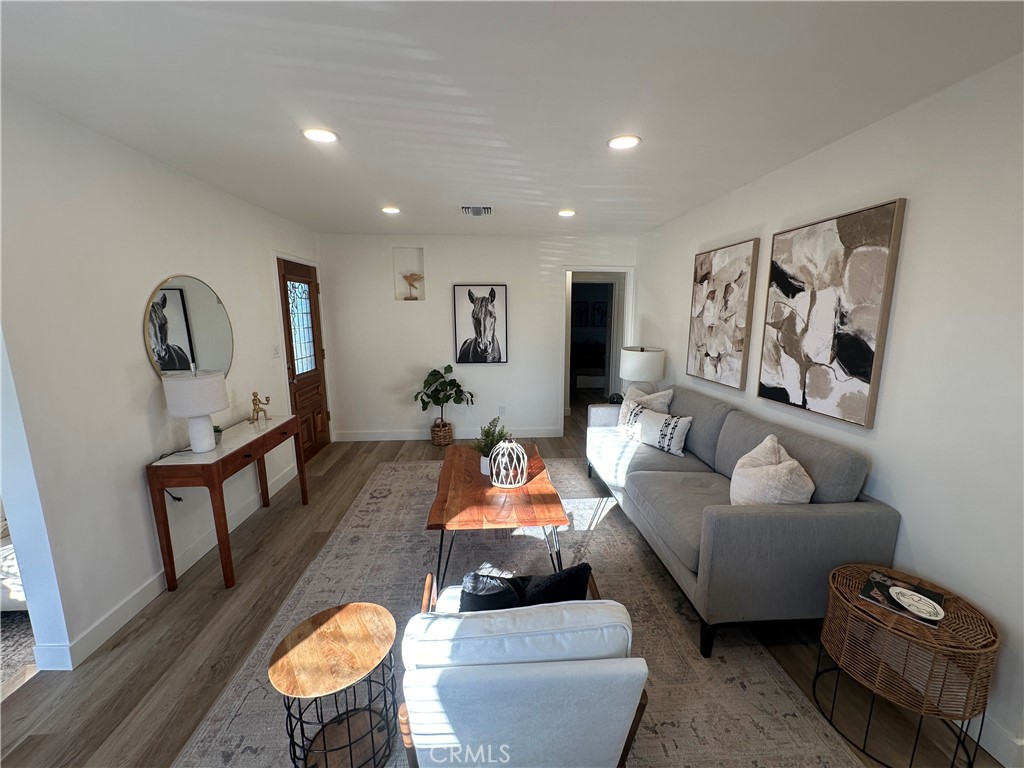 6401 Day Street Tujunga, CA 91042 - Photo 16 of 33 a living room with furniture and wooden floor