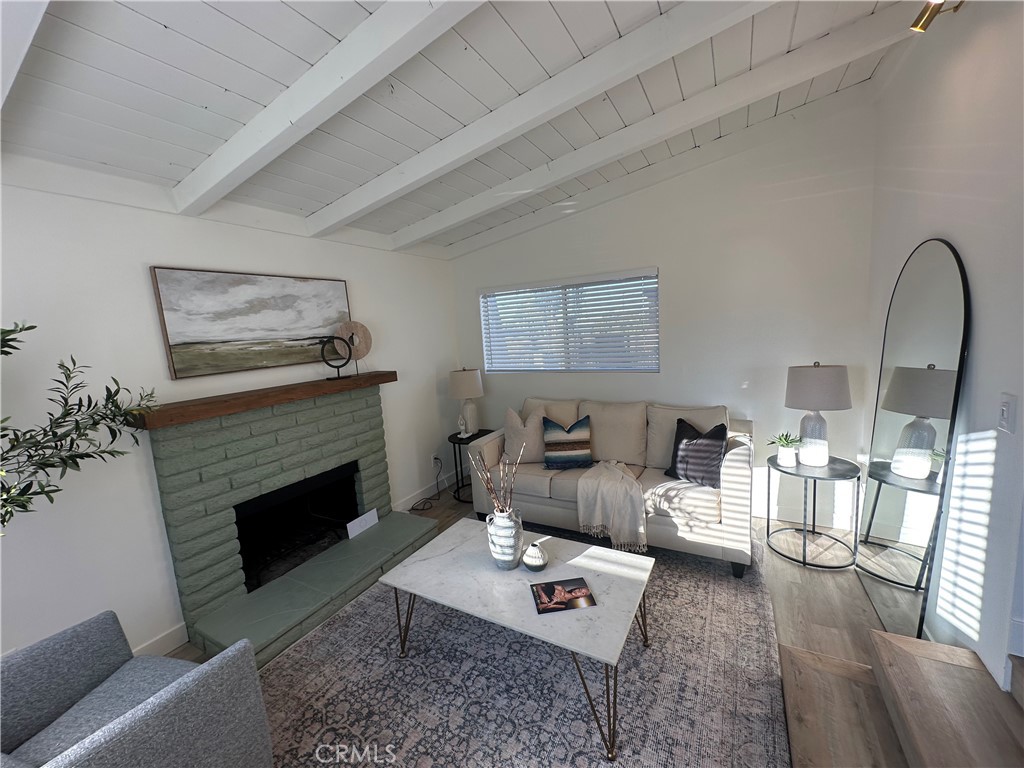 6401 Day Street Tujunga, CA 91042 - Photo 19 of 33 a living room with furniture and a fireplace
