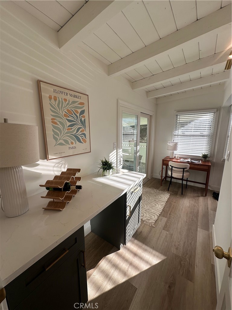 6401 Day Street Tujunga, CA 91042 - Photo 32 of 33 a kitchen with a sink cabinets and wooden floor