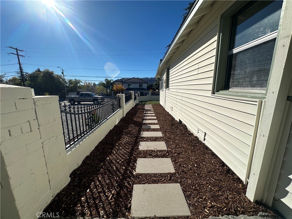 6401 Day Street Tujunga, CA 91042 - Photo 10 of 33 a view of a balcony with wooden floor and fence