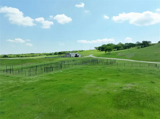 a view of a golf course with a lake