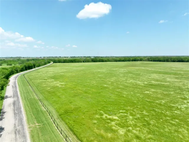 a view of a lake from a yard