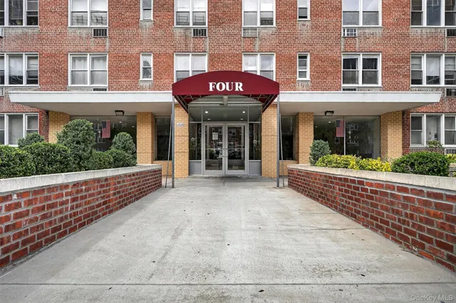 a front view of a building with a porch