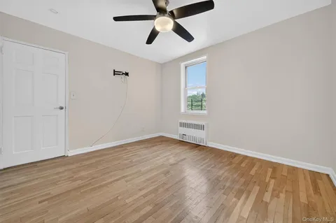 a bathroom with a sink a toilet and shower curtain
