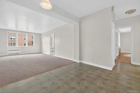 a view of a hallway with closet area
